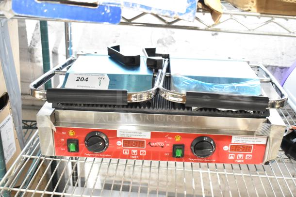 Brand new Avantco 177PG400T stainless steel dual panini grill, timer, grooved plates, 19 5/8" x 9 1/8" surface, 120V.