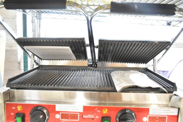 Brand new Avantco 177PG400T stainless steel dual panini grill, grooved plates, 19 5/8"x9 1/8" surface, with timer. 120V.