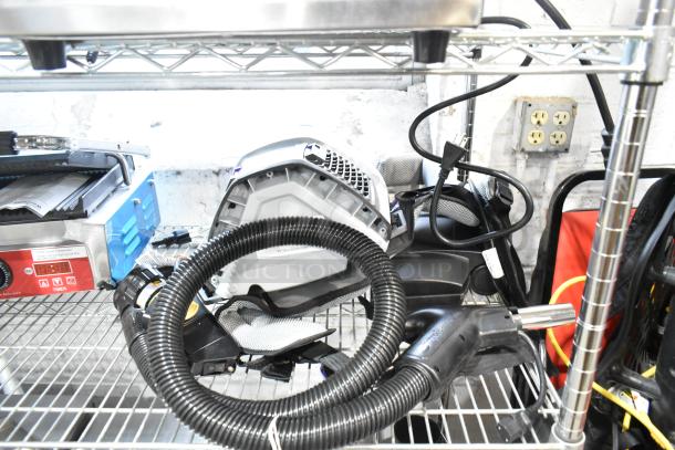 BRAND NEW SCRATCH AND DENT! ProTeam 1076770 GoFit 6 PH Backpack Vacuum, 120V, 1 Phase, on display shelf.