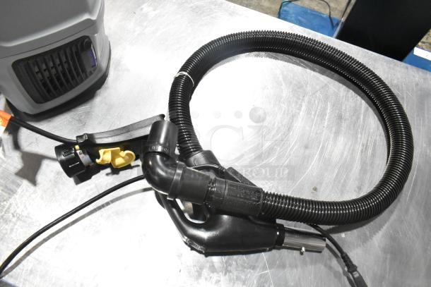 Brand new ProTeam 1076770 GoFit 6 PH Backpack Vacuum, 120V, 1 Phase, scratch and dent condition; includes hose and attachments.