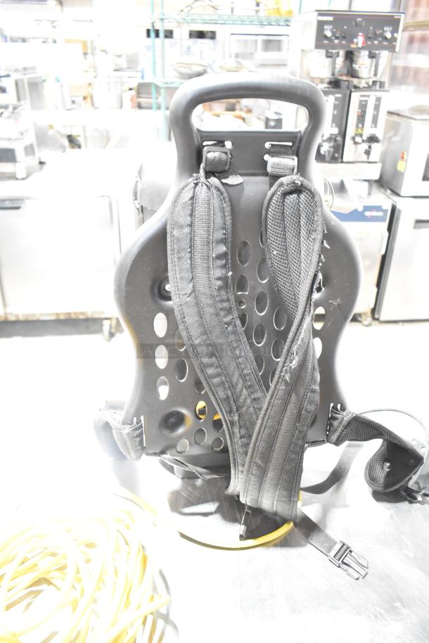 Sanitaire SC412B backpack vacuum, brand new with minor scratches. Padded straps, durable design, 120V, 1 phase.