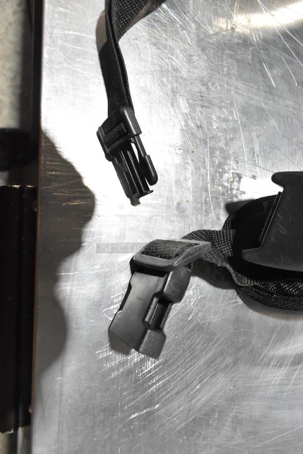 Close-up of harness strap and buckle from a 2024 Sanitaire SC412B QuietClean Backpack Vacuum. Brand new, 120V, 1 Phase.