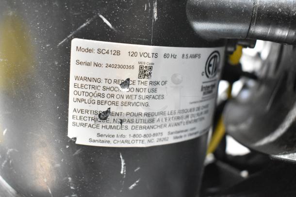 2024 Sanitaire SC412B QuietClean Backpack Vacuum, 120V, 1 Phase, brand new with minor scratches, model label visible.