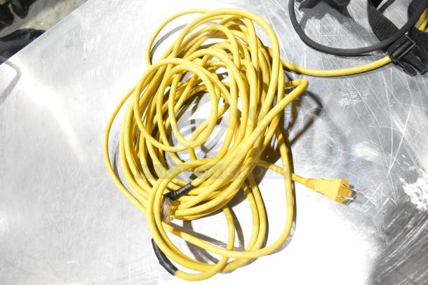 Yellow power cord for Sanitaire SC412B Backpack Vacuum, new condition, shows mild scratches. Suitable for 120V, 1-phase use.