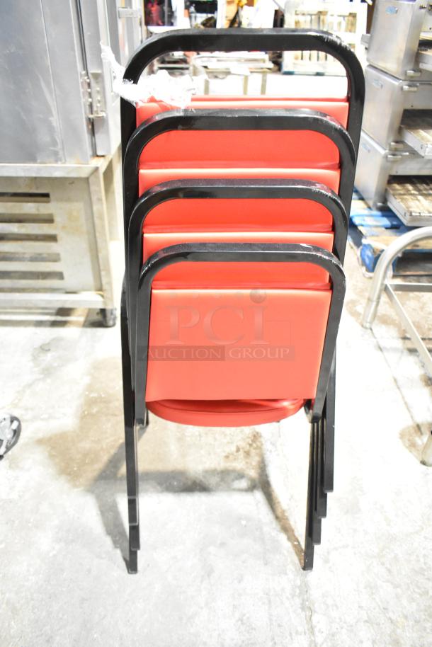 4 new black metal dining chairs with red cushions, stackable. Scratch and dent condition.