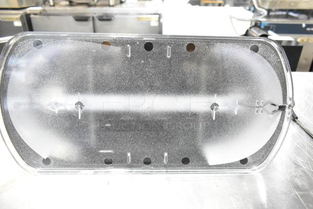 Brand new slushie hopper lid with minor scratches, clear plastic, multiple cutout holes for secure fit. Set of 2 available.