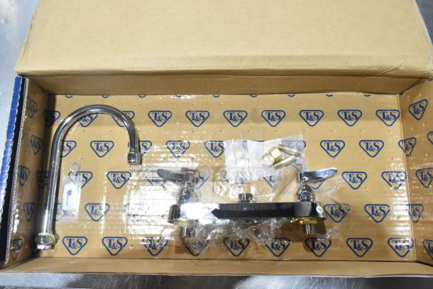 BRAND NEW T&S B-1142 deck-mounted faucet, 8" centers, 5 3/4" swivel gooseneck spout, in original packaging, scratch and dent condition.