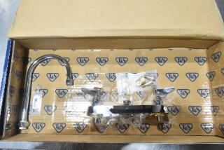 BRAND NEW T&S B-1142 deck-mounted faucet, 8" centers, 5 3/4" swivel gooseneck spout, in original packaging, scratch and dent condition.