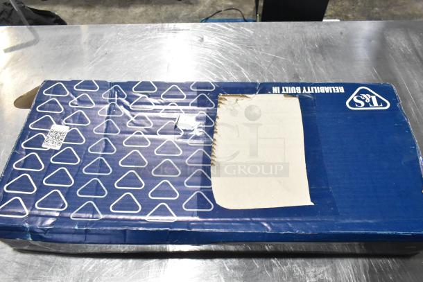 Brand new T&S B-1142 workboard faucet in original box with scratch and dent damage. Box shows T&S logo and QR code.