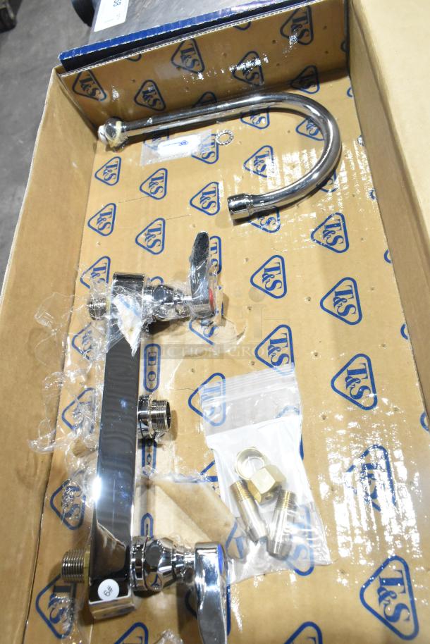BRAND NEW SCRATCH AND DENT T&S B-1142 faucet with 8" centers, 5 3/4" swivel gooseneck spout, parts included in original box.