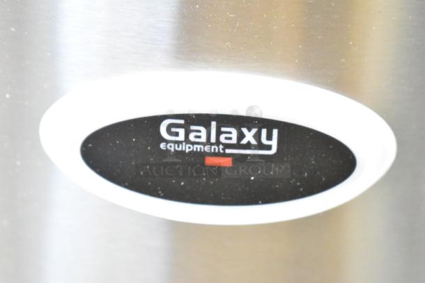 Brand new Galaxy 177RWGB90 electric rice warmer, 120V, 90 cup capacity, minor scratch and dent, logo visible on stainless surface.