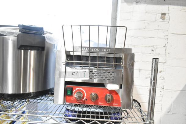 Brand new Avantco 184T3300D stainless steel conveyor toaster, 10" wide, 3" opening, 800 slices/hour, 240V, 1 phase.