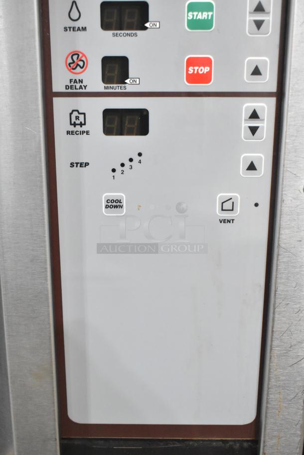 Baxter stainless steel control panel for a commercial gas-powered mini rotating rack oven, featuring digital settings and controls.