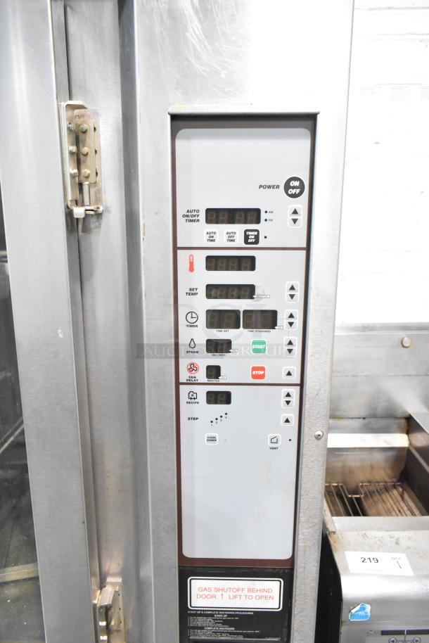 Baxter stainless steel commercial mini rotating rack oven, natural gas powered, control panel shown, 95,000 BTU, with casters.