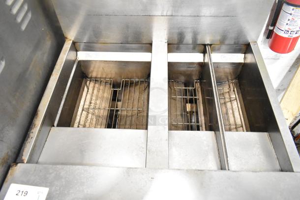 Frymaster FPGL230 stainless steel 2-bay deep fat fryer, natural gas powered, 75,000 BTU, commercial use, visible wear.