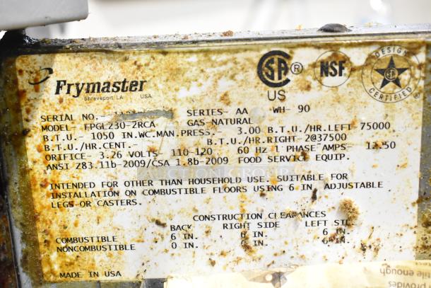 Frymaster FPGL230 natural gas fryer label, showing model, BTU ratings, and installation notes, with visible wear and rust.