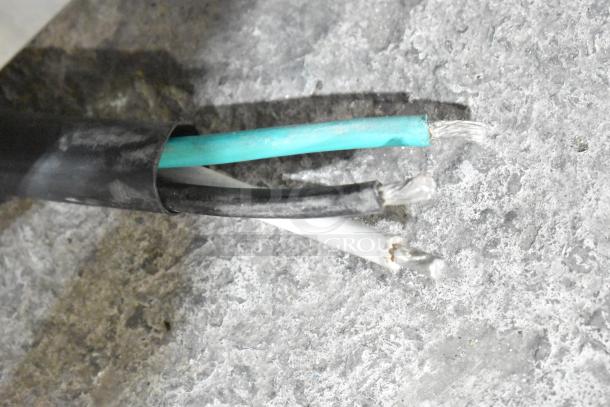 Three exposed wires from a Cooking Performance Group CPG 351ICOED pizza oven, showing the internal wiring.