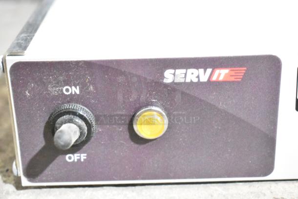 Brand new ServIt 423SW60TLHDBLA strip warmer control panel, showing dual toggle switches and ServIt logo.