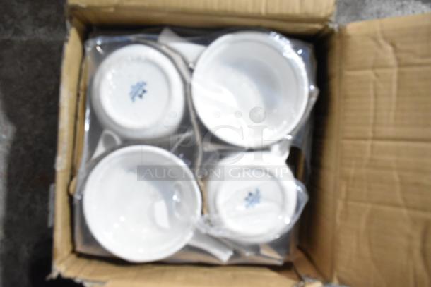 Box of Tuxton BWS-1202 12 oz. White China French Casserole Bowls, new condition, visible markings on bottom.