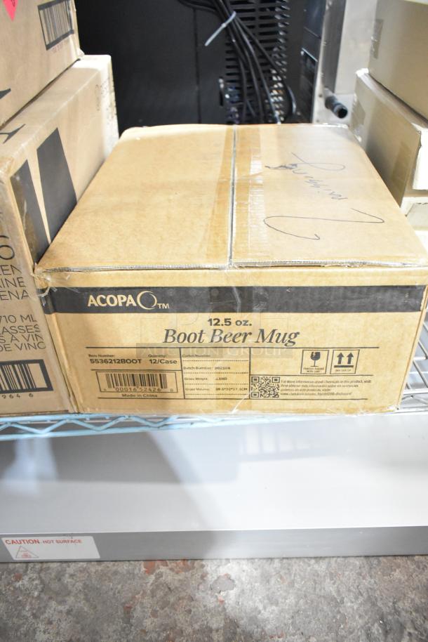Acopa 12.5 oz. Boot Beer Mug box, 12 mugs per case, visible on shelf, includes label with item and batch numbers.