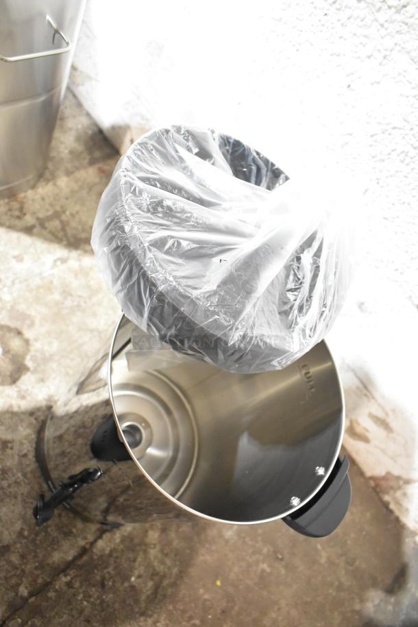 Brand new Galaxy 100 Cup Stainless Steel Coffee Urn, 120V, 1,500W, scratch and dent condition, plastic-wrapped handle visible.