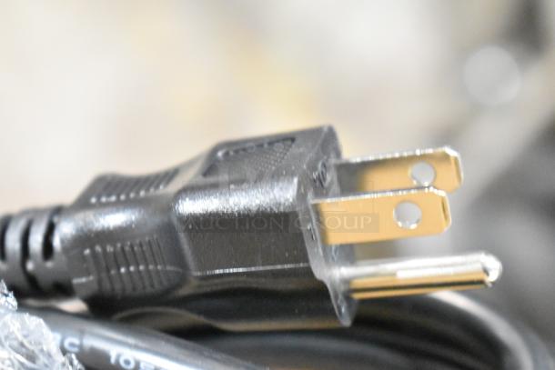 Close-up of a standard electrical plug for Galaxy 100 Cup Stainless Steel Coffee Urn, 120V, 1,500W. Brand new condition.