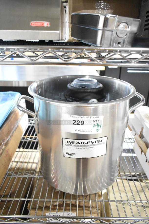 6 new scratch and dent items, including Anchor Hocking Montana jar and Vollrath Wearever stock pot; auction tag visible.