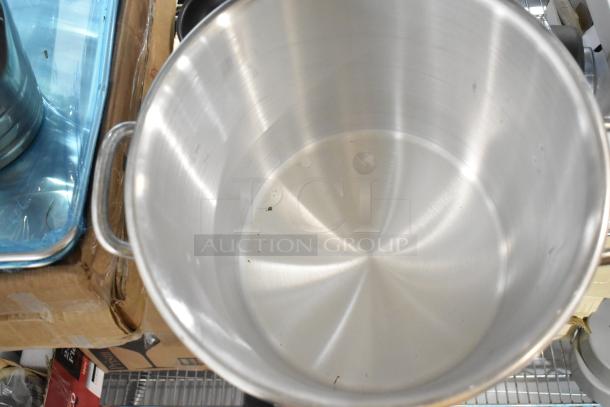 Six new scratch and dent items including Anchor Hocking 97694AHG17 Montana 96 oz. mini jar, Vollrath Wearever stock pot.