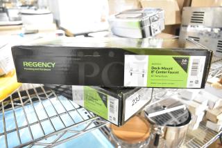 Regency 600FD810 deck-mounted faucet, 8" centers, 10" swing spout, 2.0 GPM, new condition, boxed with labels.