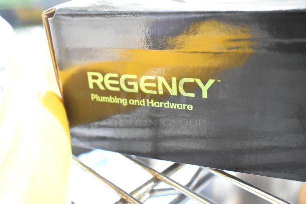 Alt text: Regency 600FD810 deck-mounted faucet box, showing brand logo and "Plumbing and Hardware" label. Brand new, scratch and dent condition.
