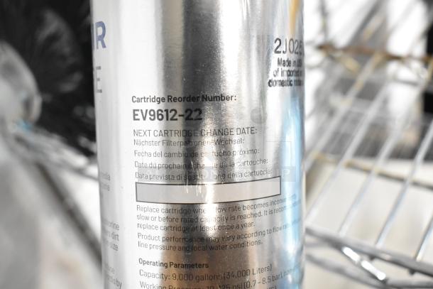Pentair i2000 filtration cartridge, model EV9612-22, brand new, with replacement date and operating parameters visible.
