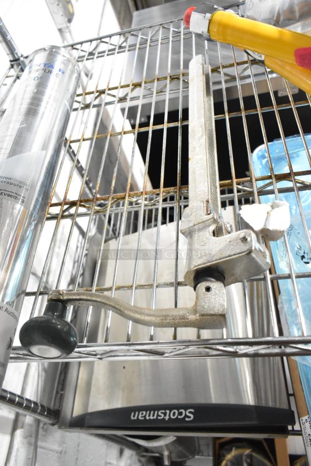 9 brand new scratch and dent items including a Pentair i2000 filtration cartridge, can opener, and Dormont gas hose.