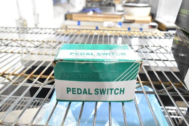 Green box labeled "Pedal Switch" on metal shelf, part of a lot including Pentair filtration cartridges and gas hoses.