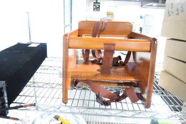 BRAND NEW Walnut Wood Booster Seat, model BS-200-MOD-W2, with T-Strap. Minor scratches, durable wood finish.