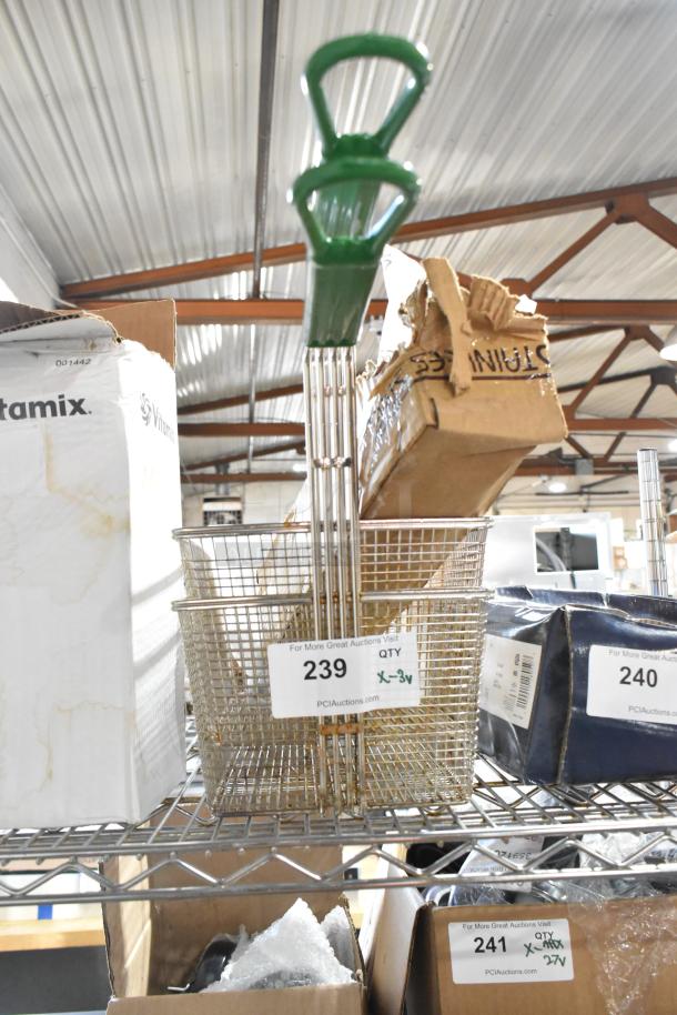 3 brand new scratch and dent items, including a Choice 17648013 3.5 oz Paneled Sherbet Dish and metal baskets. Item labeled as 239.
