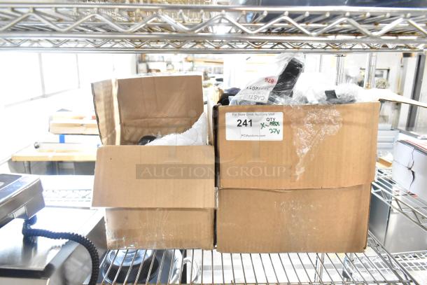 Boxes containing 27 brand new scratch and dent items, including 5" casters for tables and ranges.