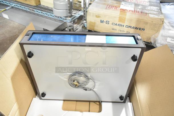 New M-S 73084-054 cash drawer in packaging. Features include cable and key. Model and condition labels visible.