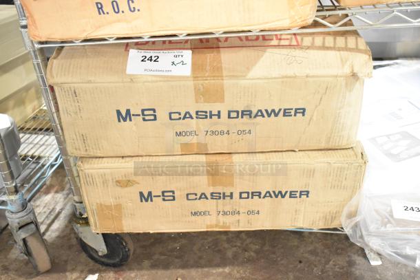 Two brand new M-S 73084-054 cash drawers in original boxes, auction label indicating double quantity.