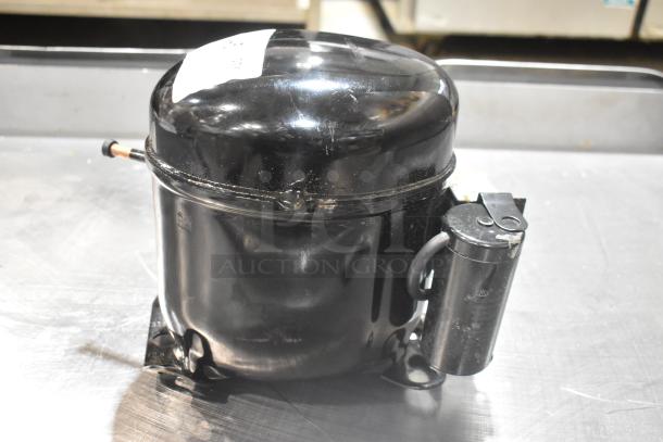 Brand new Cubigel NPY12LR motor, 115-127V, 1 phase, sleek black finish, visible model label.