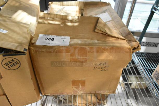 Box with "Cash Register Tills" label on a shelf. Packaging shows some wear but is sealed. Includes three new inserts.