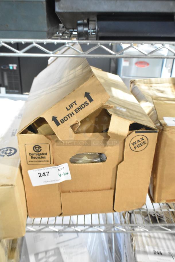 Brown cardboard box labeled "Lift Both Ends," contains various kitchen items including Vollrath 4780912 tongs, scoopers, and dippers. Item condition: brand new.