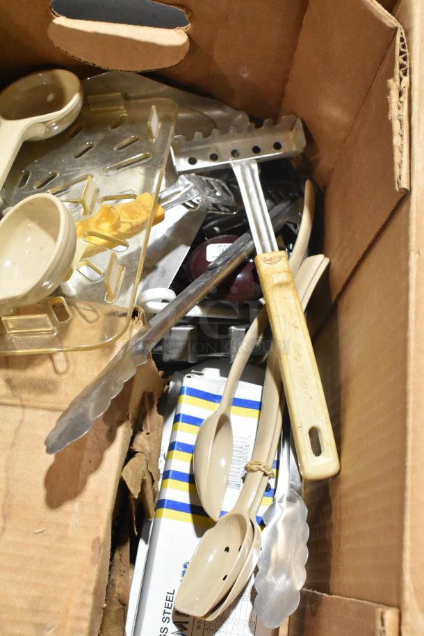 Brand new lot including Vollrath 4780912 tongs, scoopers, and dippers in a cardboard box. Various kitchen utensils.