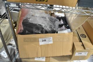 Cardboard box containing TPOS1225 monitor, wrapped in protective plastic and bubble wrap, auction label "249 QTY x2."