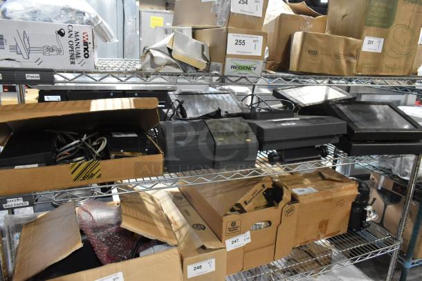 Auction items include POS monitors and receipt printers on metal shelving, boxed and unboxed, various conditions.