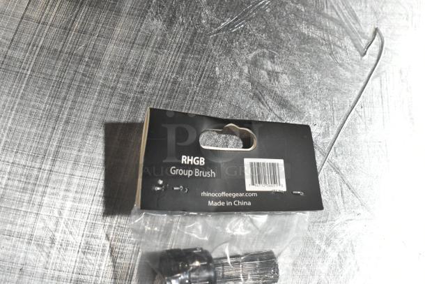 Packaged RHGB Group Brush with label showing barcode and origin, sealed in plastic.