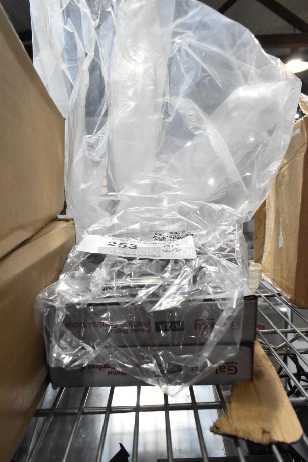 Three brand new items, including Galaxy 177GPCR10 10 lb. round digital portion control scale, with packaging visible.