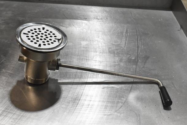 Brand new Regency 600DT1 twist handle waste valve, fits 3 1/2" sink opening, chrome finish, unused condition.