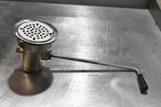 Brand new Regency 600DT1 twist handle waste valve, fits 3 1/2" sink opening, chrome finish, unused condition.