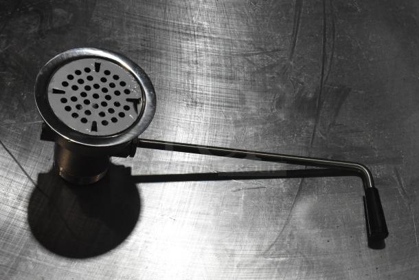 Brand new Regency 600DT1 twist handle waste valve, fits 3 1/2" sink opening, metallic finish, ergonomic handle.