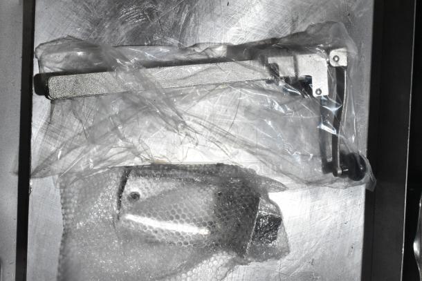 BRAND NEW Winco CO-1 Manual Can Opener, includes base, blade, gear, and installation kit, sealed in plastic and bubble wrap.